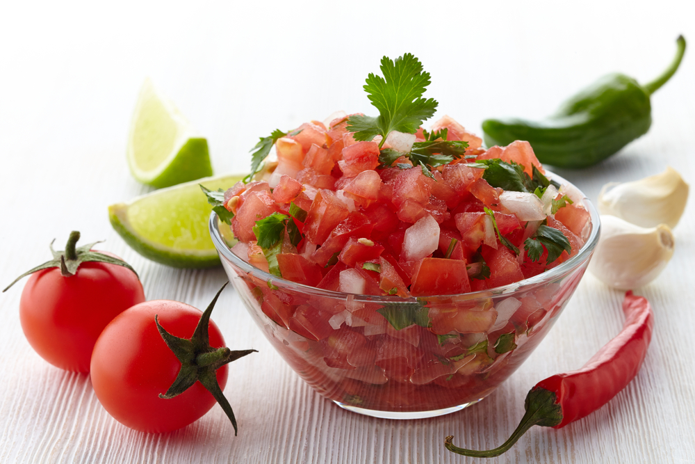 Homemade tomato salsa and rye crispbread