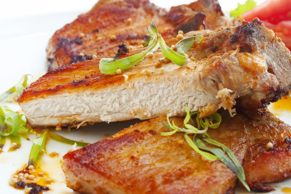 Grilled pork chops with apple sauce