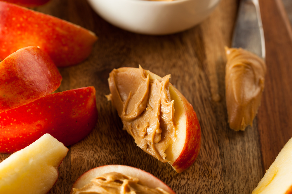 Apple and pear slices with peanut butter