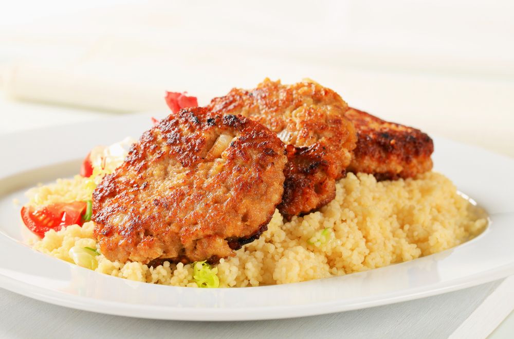 Falafel burgers with a couscous salad