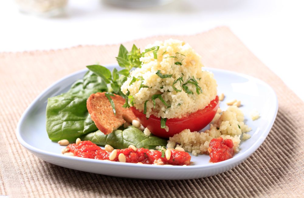 Stuffed tomato with herb couscous